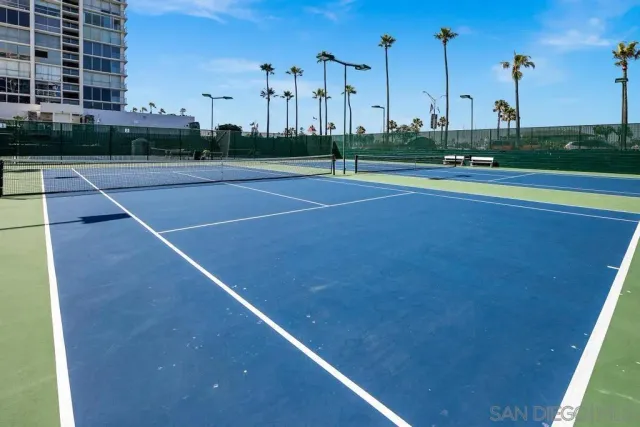 a swimming pool with outdoor space and seating area