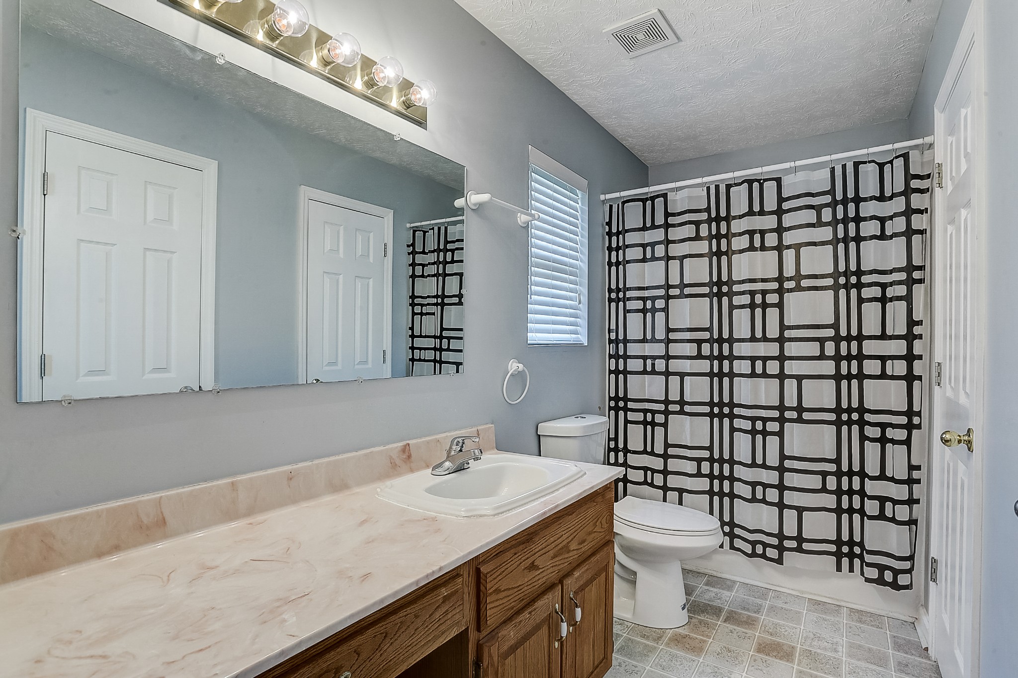 106 Vanatta Road Portland, TN 37148 - Photo 21 of 31 a bathroom with a sink toilet and shower