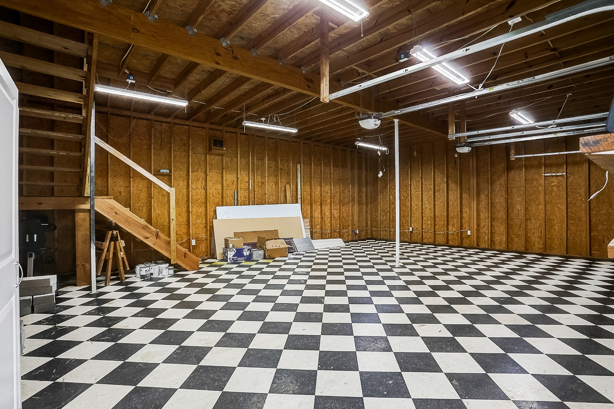 106 Vanatta Road Portland, TN 37148 - Photo 24 of 31 a black and white checkered floor