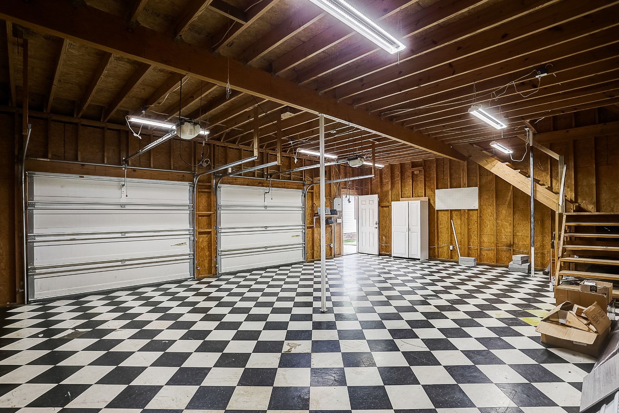 106 Vanatta Road Portland, TN 37148 - Photo 25 of 31 a black and white checkered floor