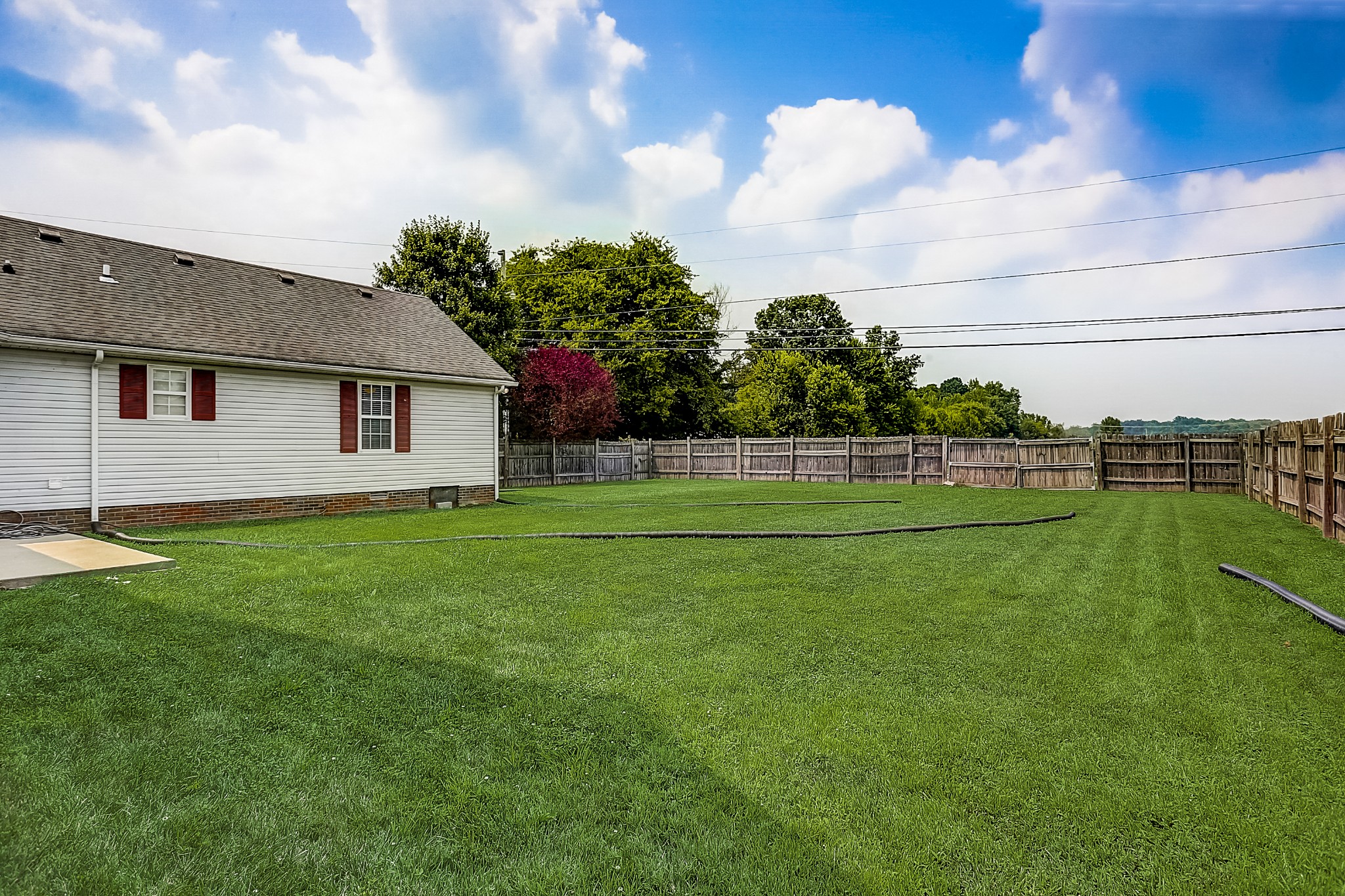 106 Vanatta Road Portland, TN 37148 - Photo 29 of 31 a view of a house with a backyard