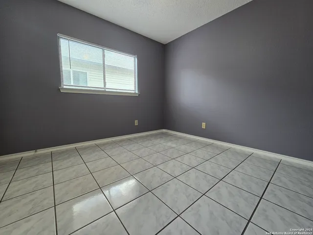 a view of a room with a window