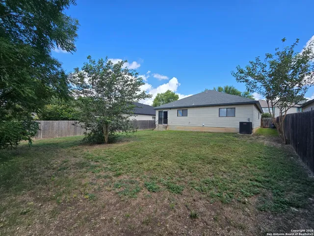 a house view with a garden space