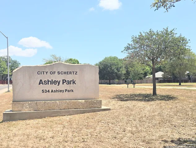 a sign on the side of a road