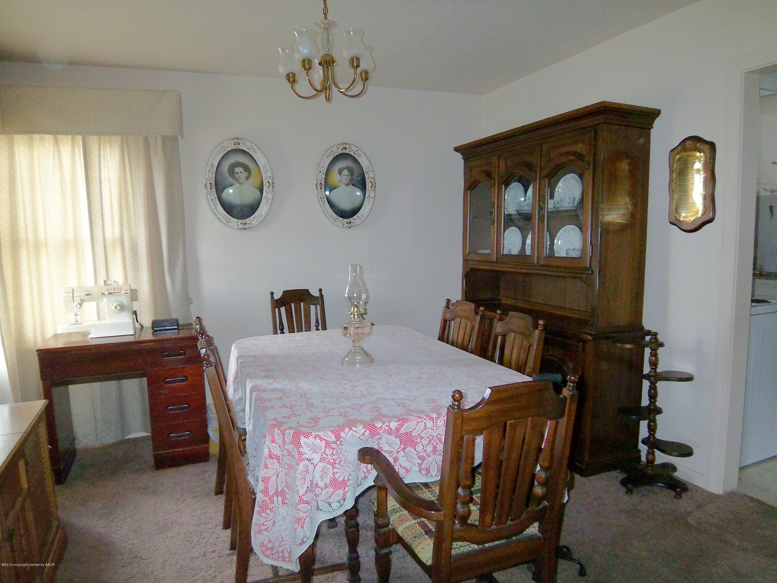 4301 Cline Road Amarillo, TX 79110 - Photo 7 of 12 a view of a dining room with furniture and window
