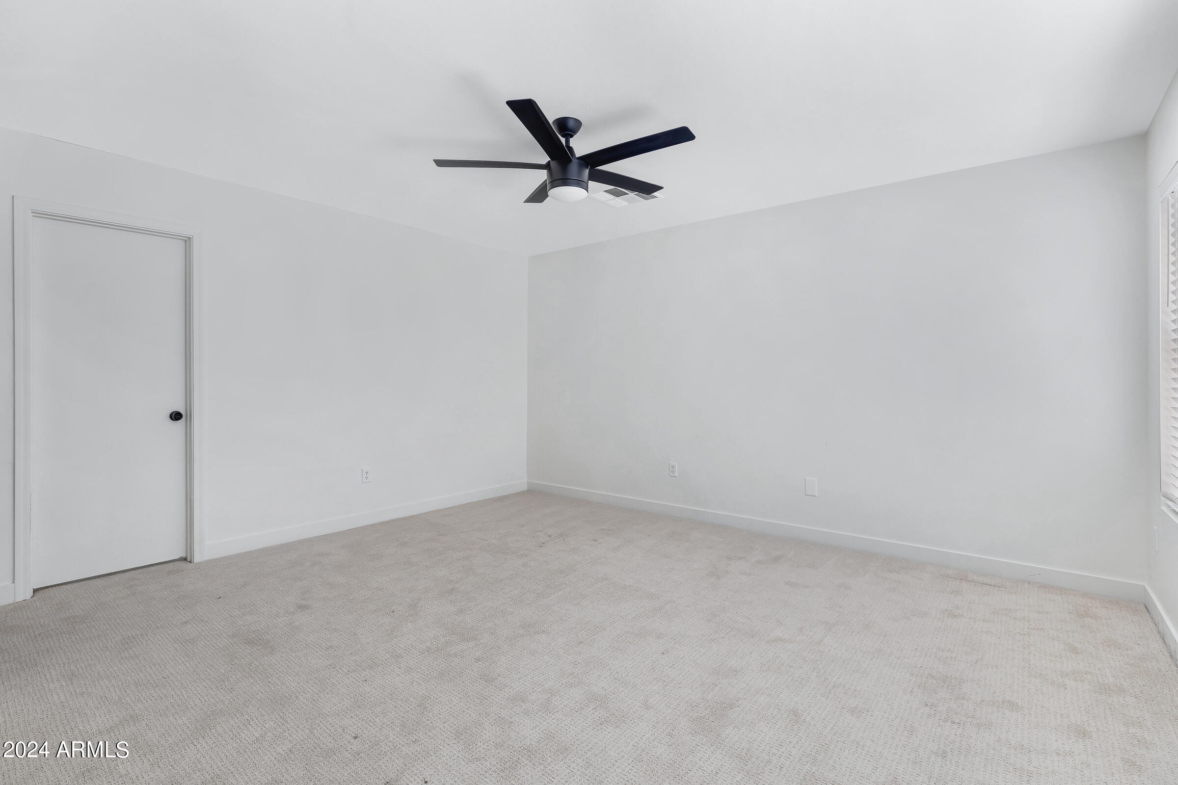 3910 West Carter Road Phoenix, AZ 85041 - Photo 30 of 40 a view of an empty room