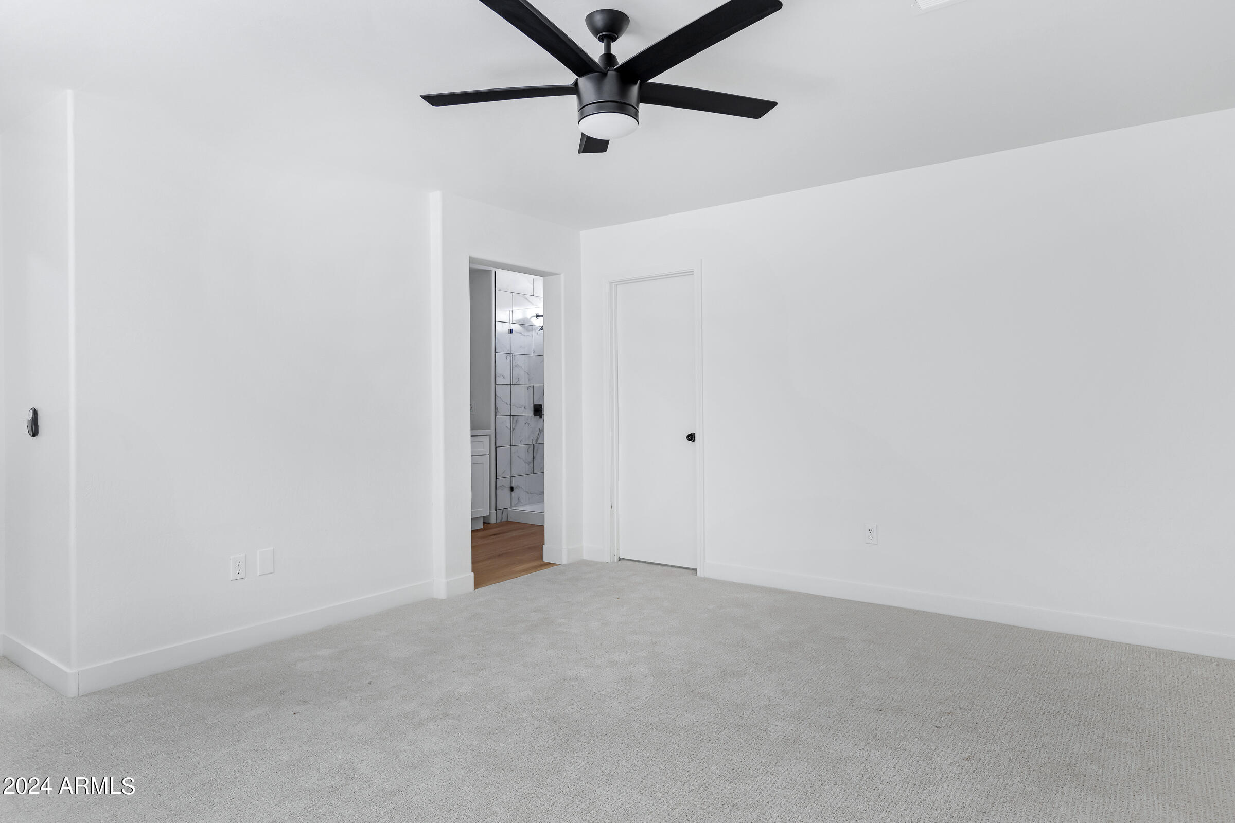 3910 West Carter Road Phoenix, AZ 85041 - Photo 32 of 40 a view of a hallway