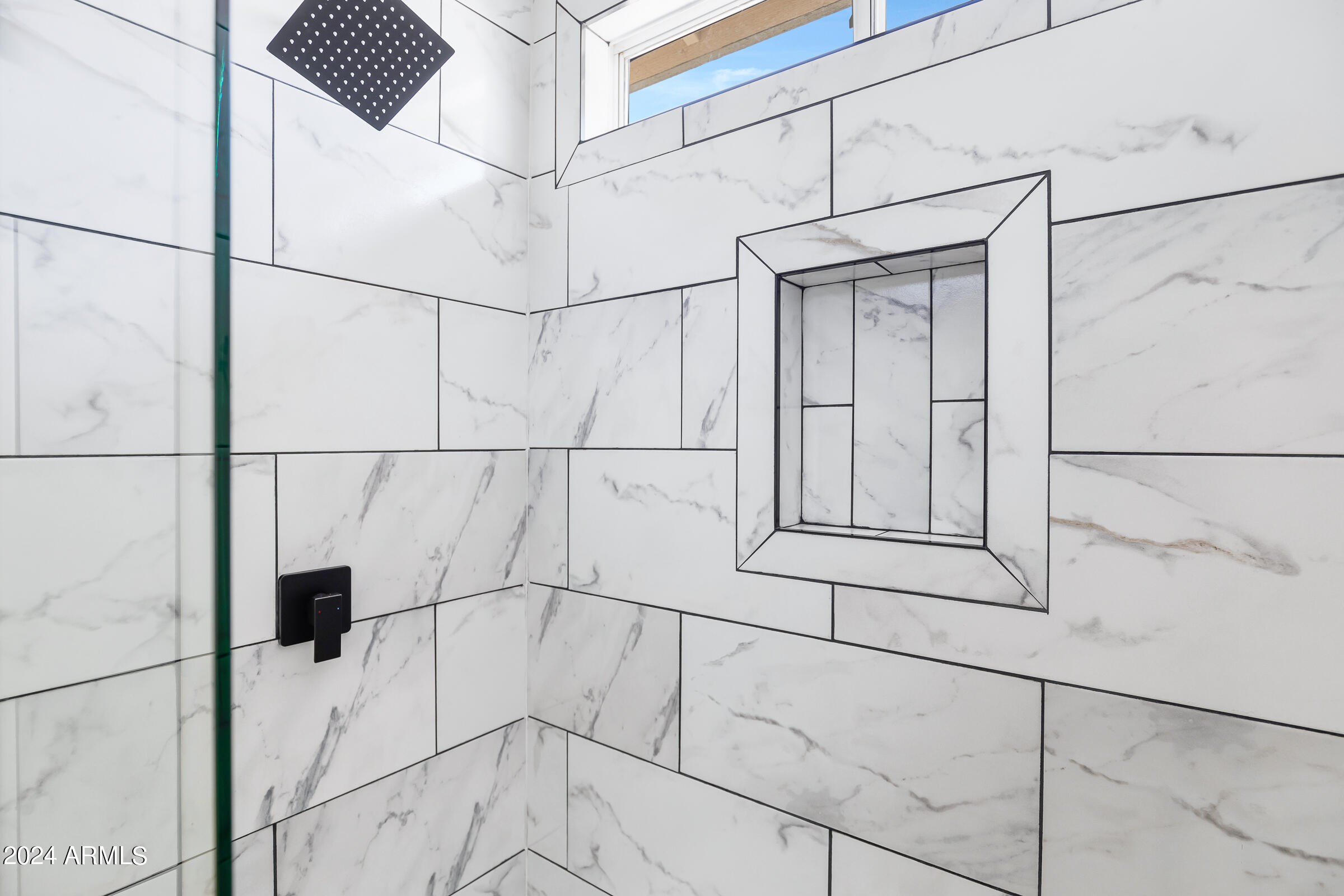 3910 West Carter Road Phoenix, AZ 85041 - Photo 36 of 40 a bathroom with a shower