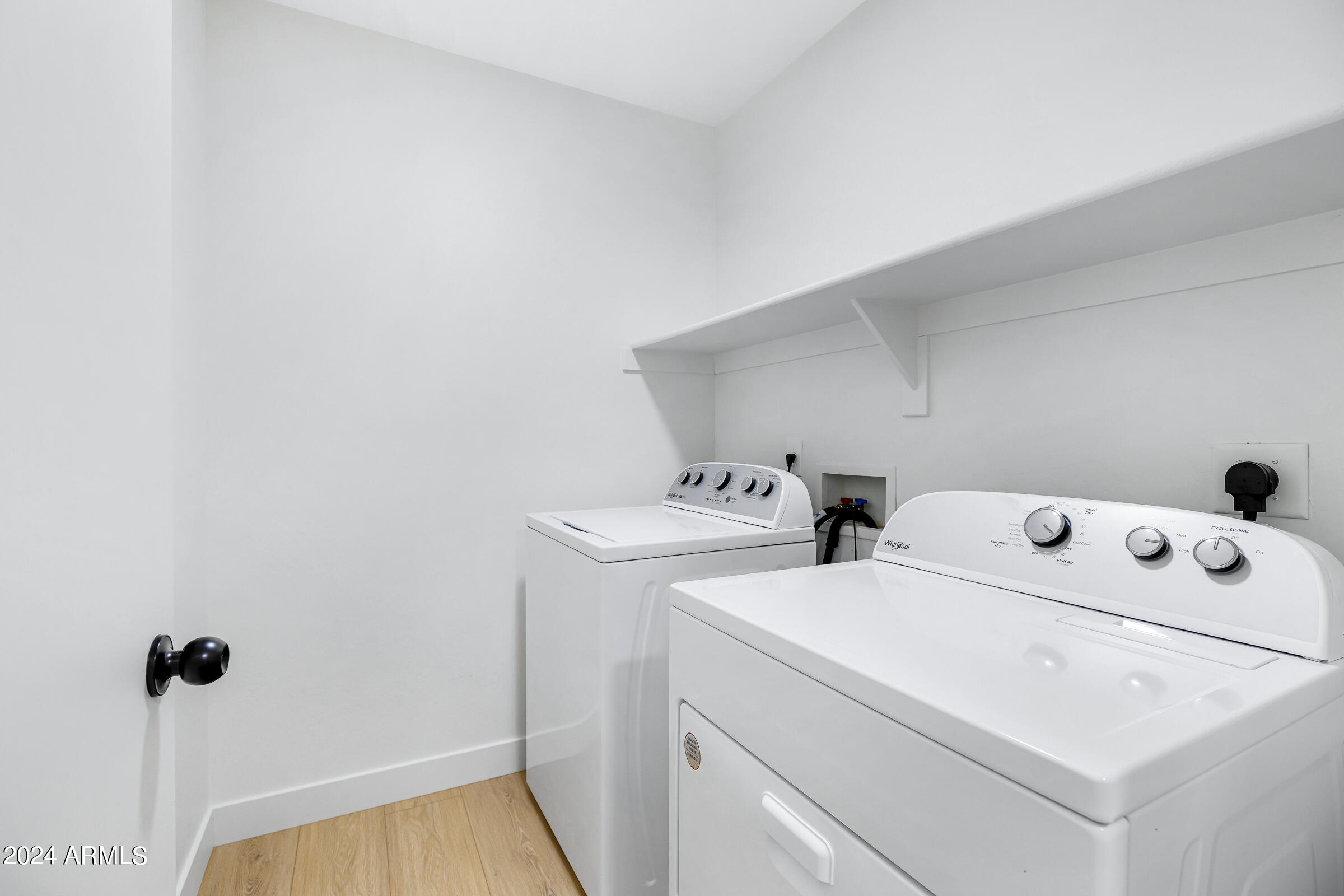 3910 West Carter Road Phoenix, AZ 85041 - Photo 37 of 40 a utility room with dryer and washer