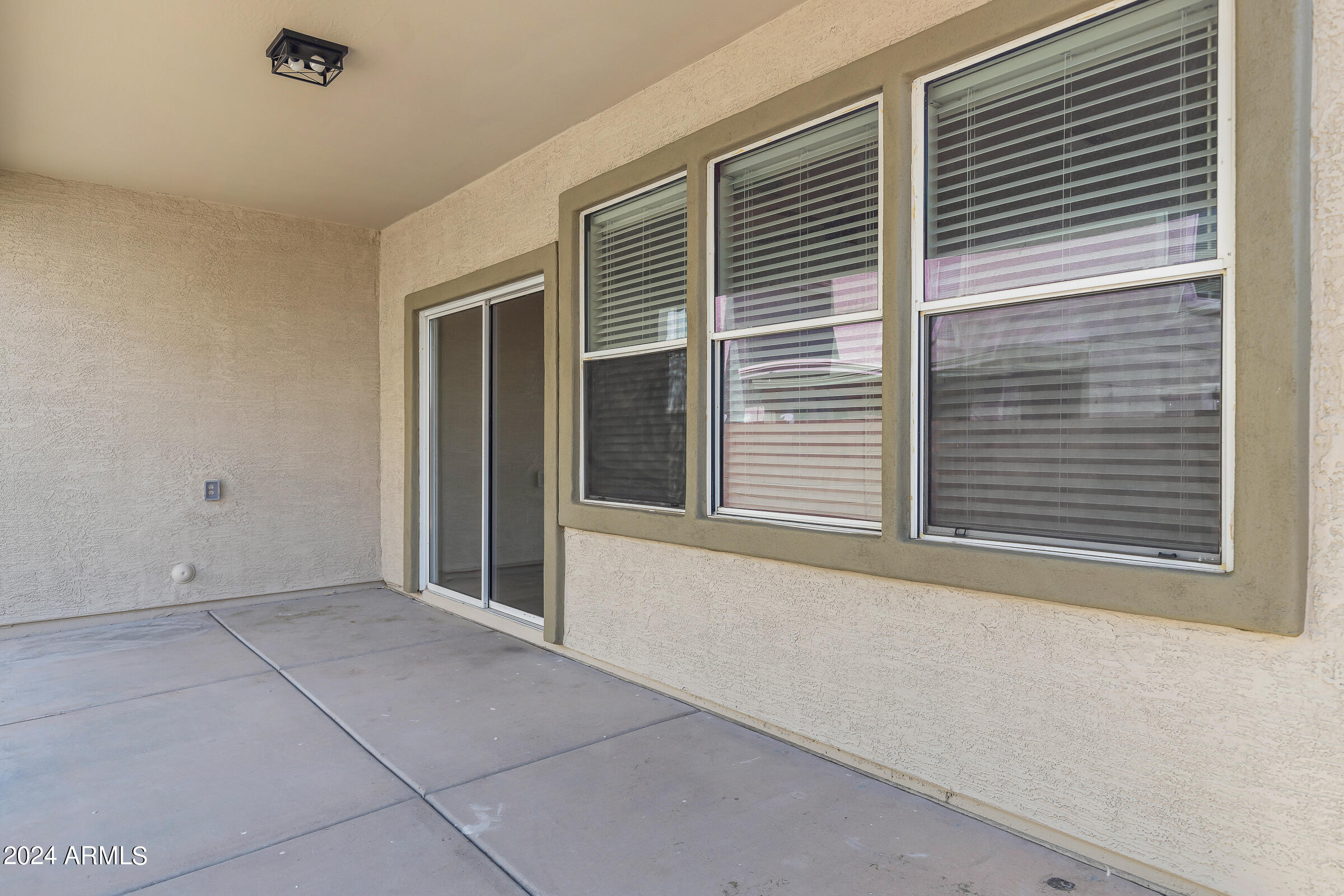 3910 West Carter Road Phoenix, AZ 85041 - Photo 40 of 40 a view of an empty room with a window