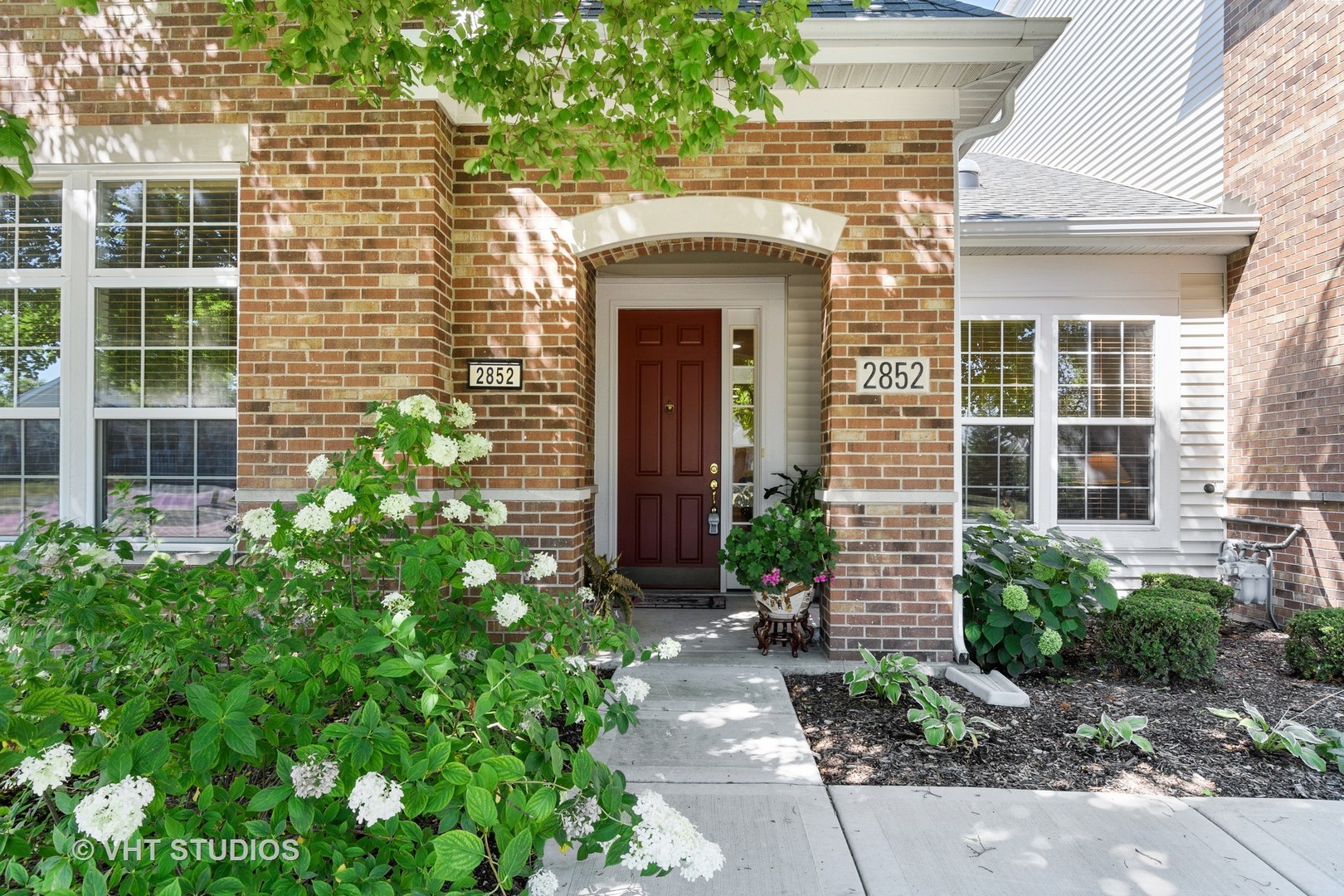2852 Normandy Circle Naperville, IL 60564 - Photo 1 of 31 a front view of a house with a yard