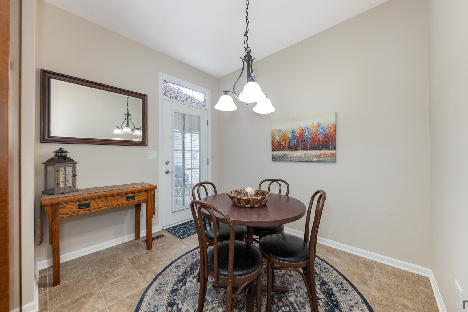 2852 Normandy Circle Naperville, IL 60564 - Photo 16 of 31 a view of a dining room with furniture and wooden floor