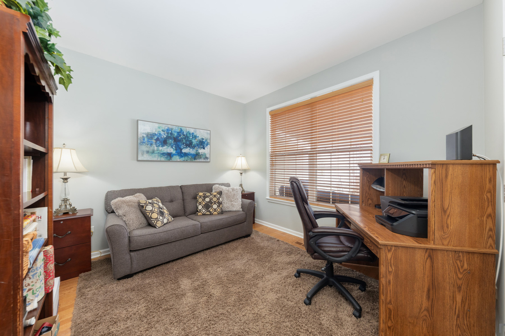 2852 Normandy Circle Naperville, IL 60564 - Photo 22 of 31 a view of a livingroom with workspace and a couch