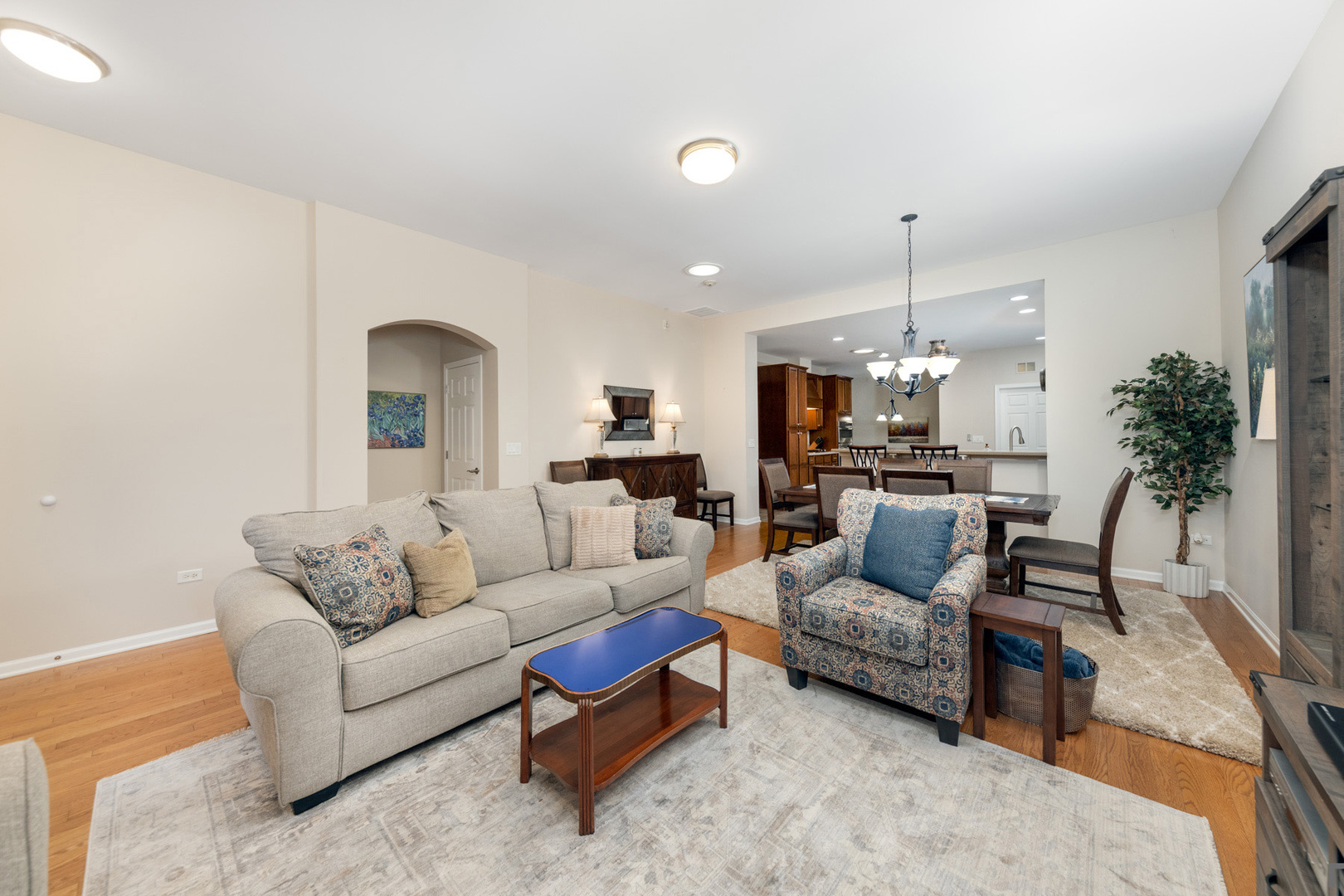 2852 Normandy Circle Naperville, IL 60564 - Photo 7 of 31 a living room with furniture and kitchen view