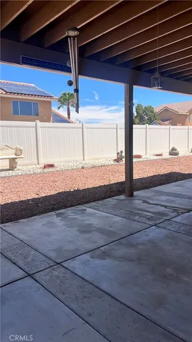 a view of a backyard of the house