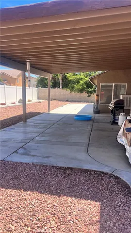 a view of a backyard and a garage