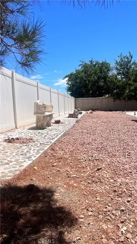a view of a backyard of a house