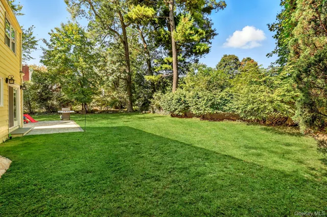 a view of a golf course with a garden