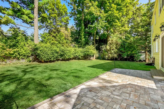 a view of a yard with an outdoor space
