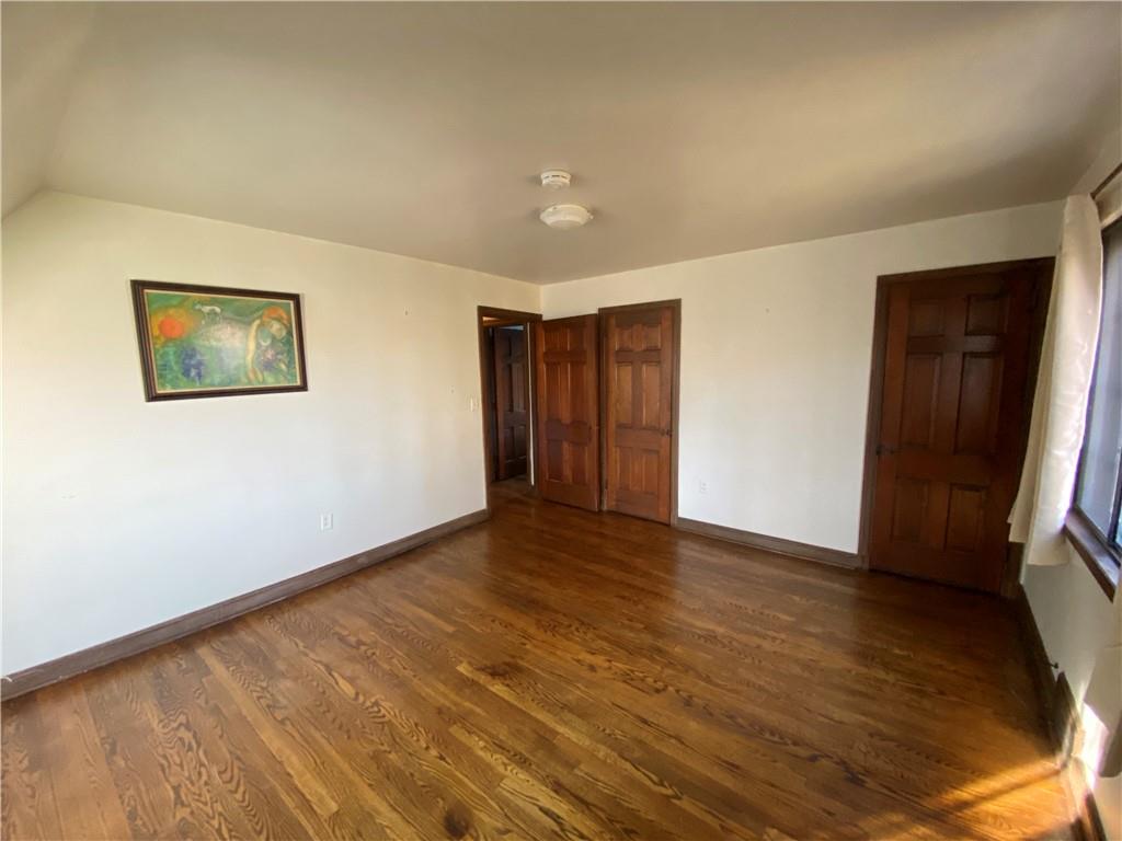 5659 Darlington Road Pittsburgh, PA 15217 - Photo 14 of 25 a view of empty room with wooden floor