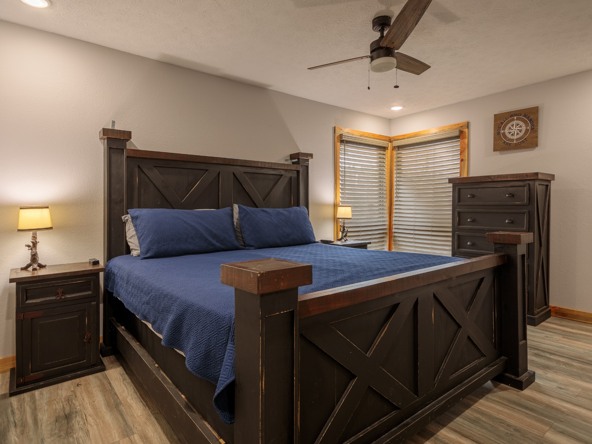 812 Starlight Lane Kodak, TN 37764 - Photo 16 of 60 a bedroom with a bed and wooden floor