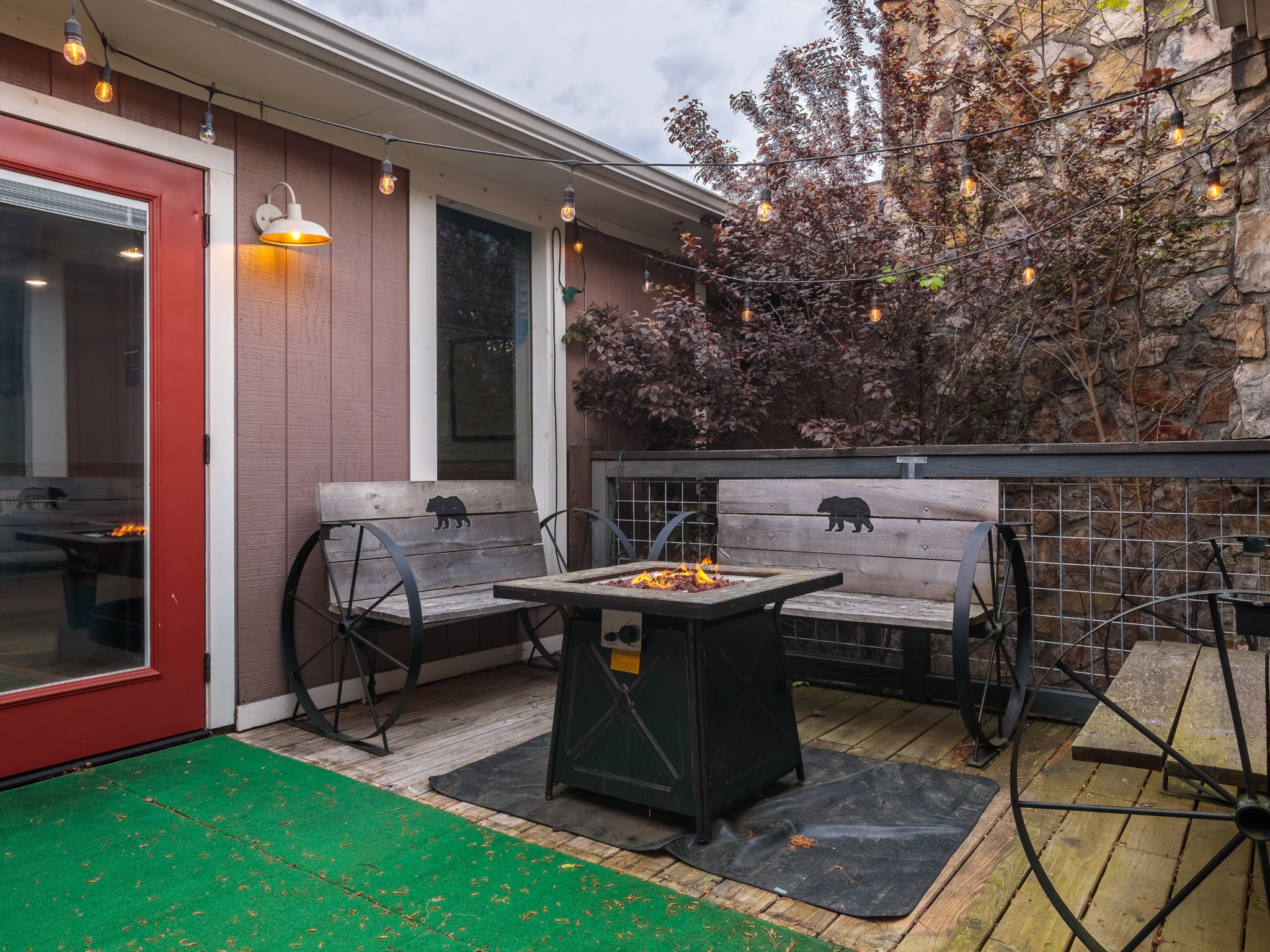 812 Starlight Lane Kodak, TN 37764 - Photo 33 of 60 a view of a patio with table and chairs a barbeque with wooden fence and floor