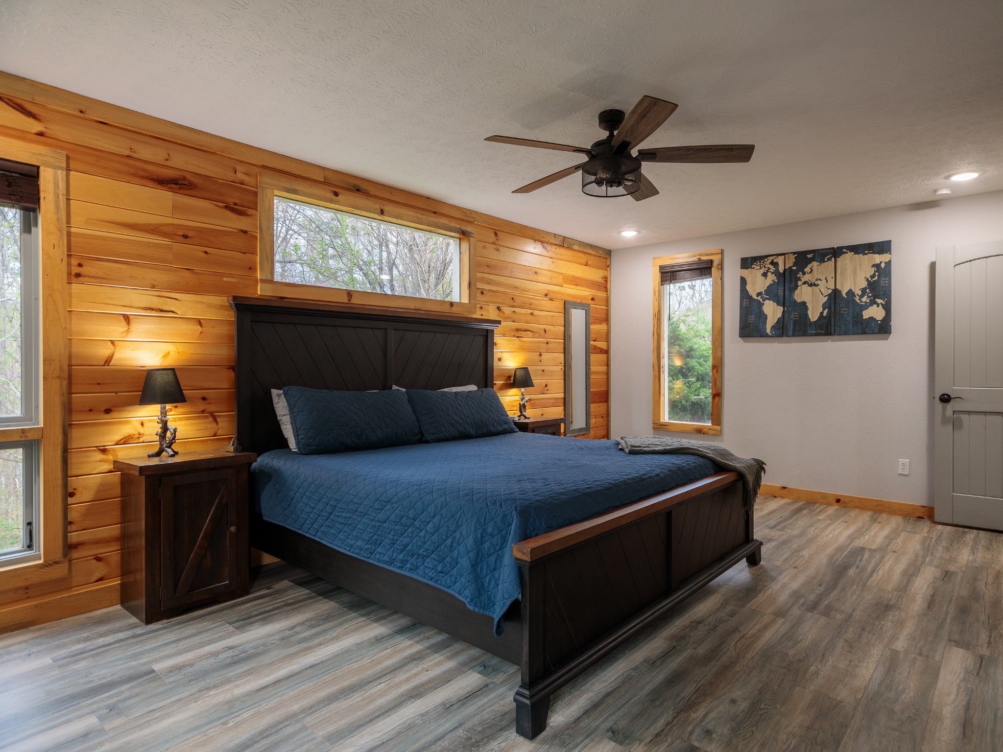 812 Starlight Lane Kodak, TN 37764 - Photo 37 of 60 a bedroom with a bed and wooden floor