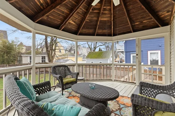 a view of backyard with a garden and entertaining space