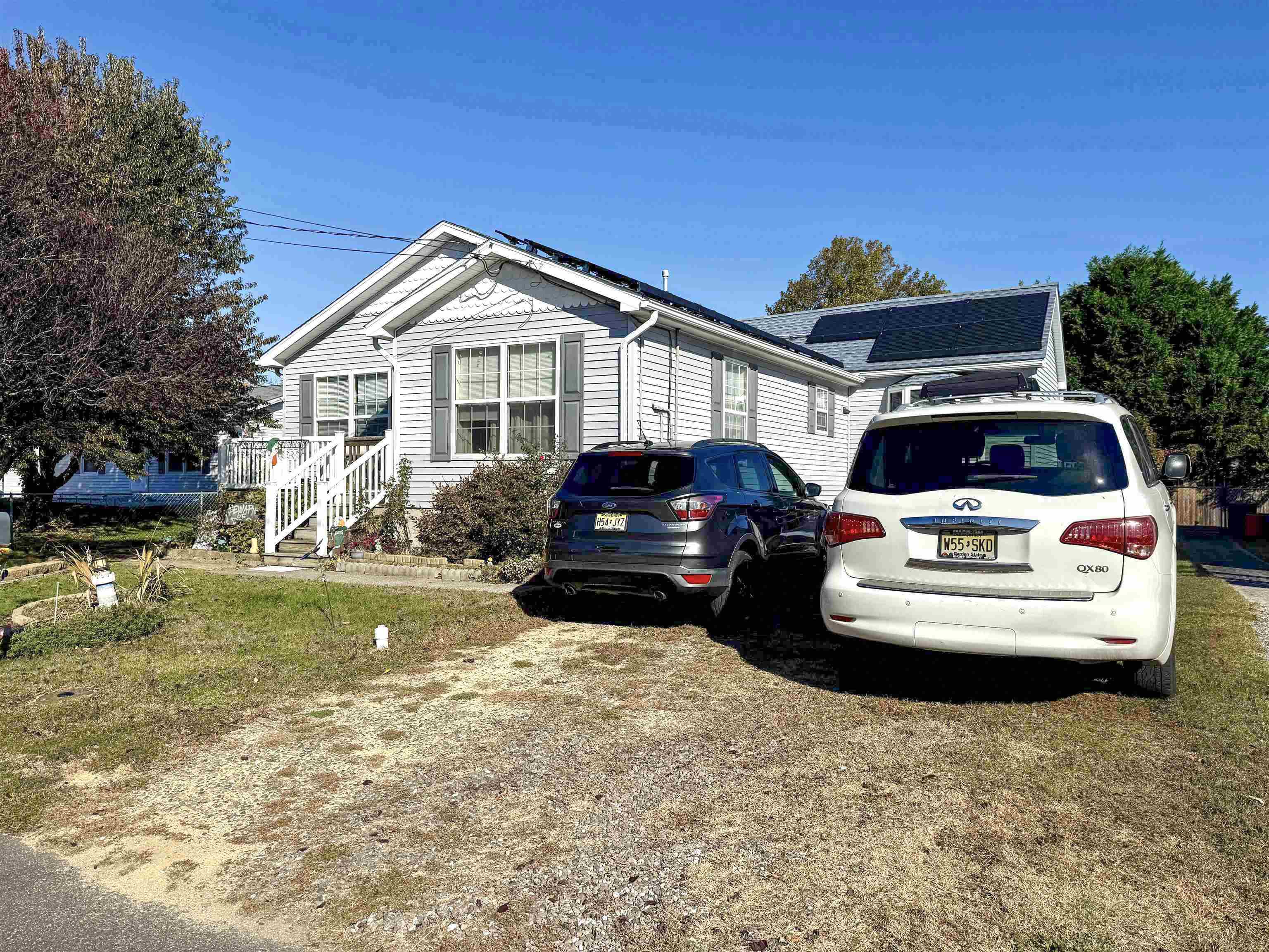 4 Rutledge Avenue Del Haven, NJ 08251 - Photo 2 of 21 a front view of a house with a garden and yard