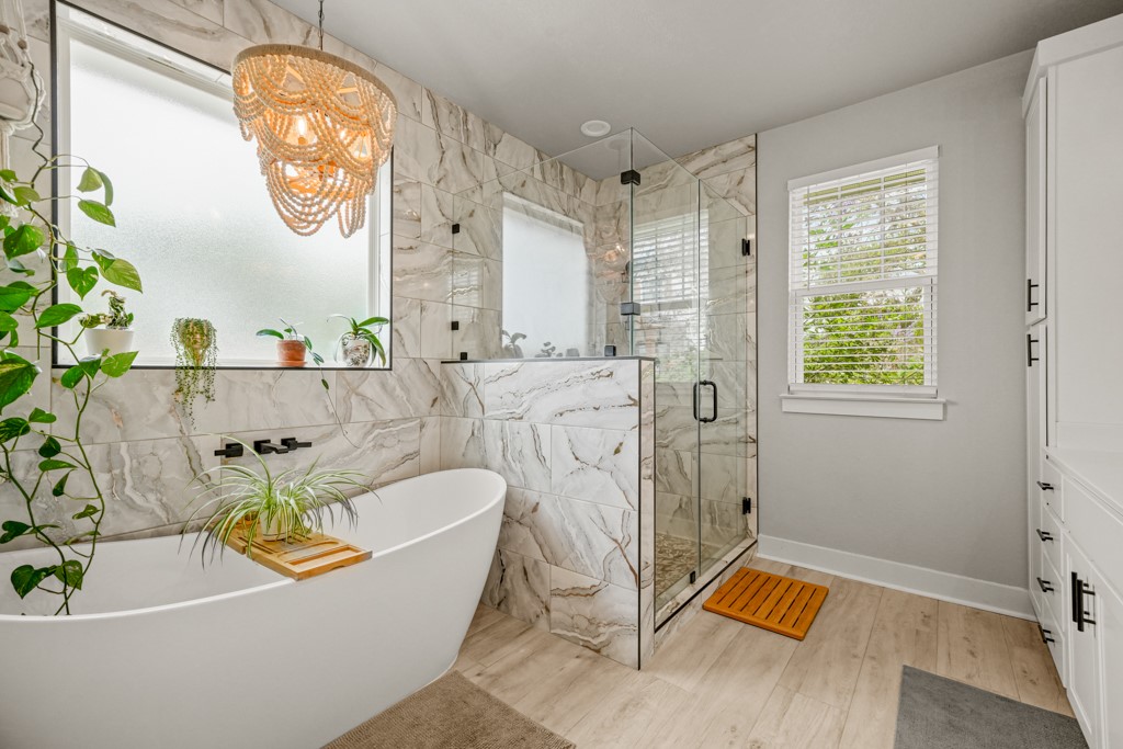 Undisclosed Address Spring Branch, TX 78070 - Photo 13 of 40 a bath tub sitting next to a window