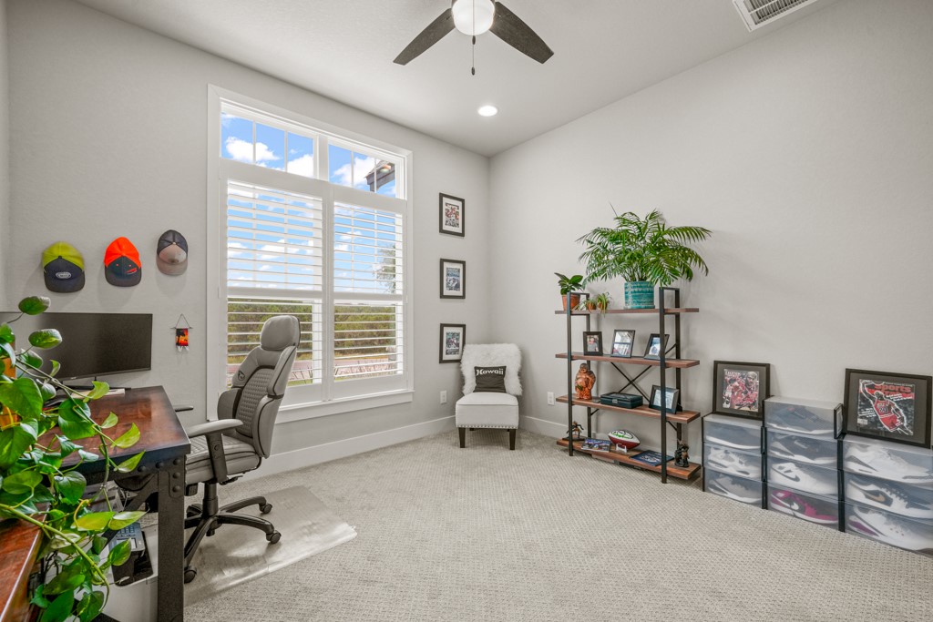 Undisclosed Address Spring Branch, TX 78070 - Photo 16 of 40 a view of a livingroom with workspace and a window