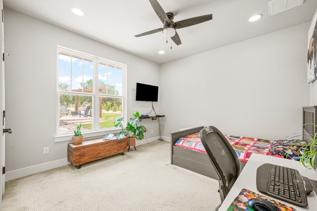 Undisclosed Address Spring Branch, TX 78070 - Photo 18 of 40 a bedroom with furniture and a window