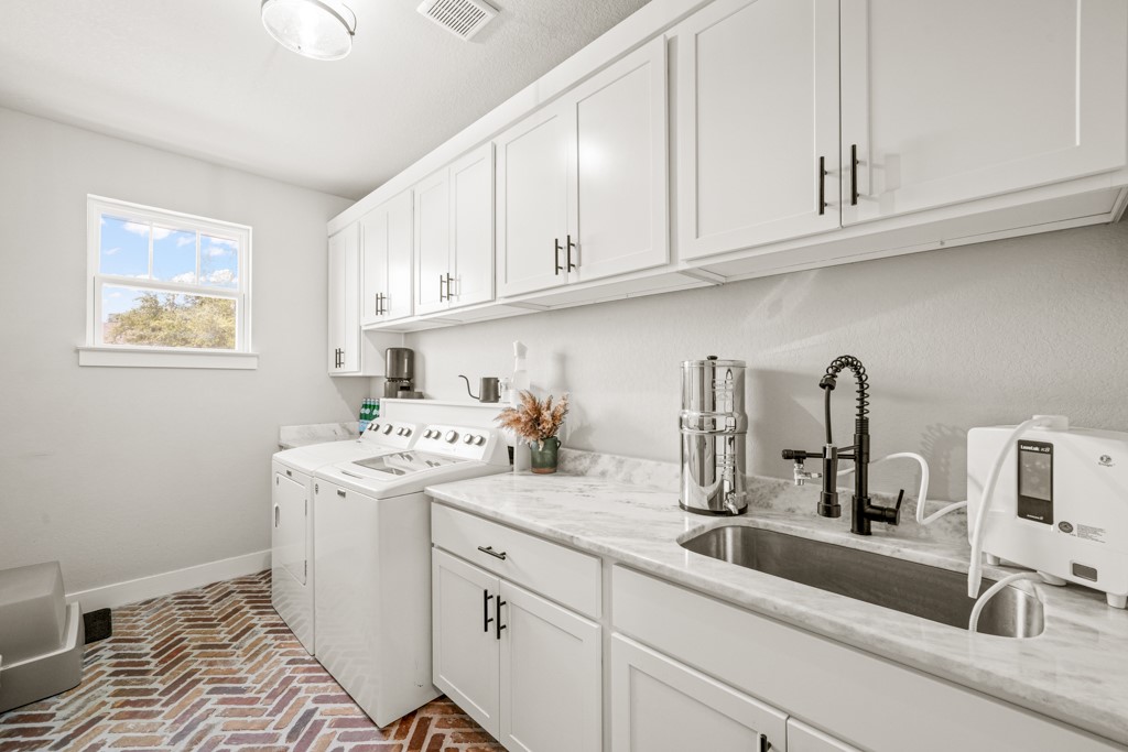 Undisclosed Address Spring Branch, TX 78070 - Photo 21 of 40 a view of a kitchen with sink and cabinets