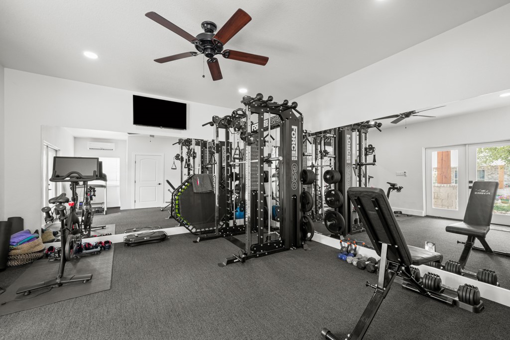 Undisclosed Address Spring Branch, TX 78070 - Photo 32 of 40 a view of a room with gym equipment