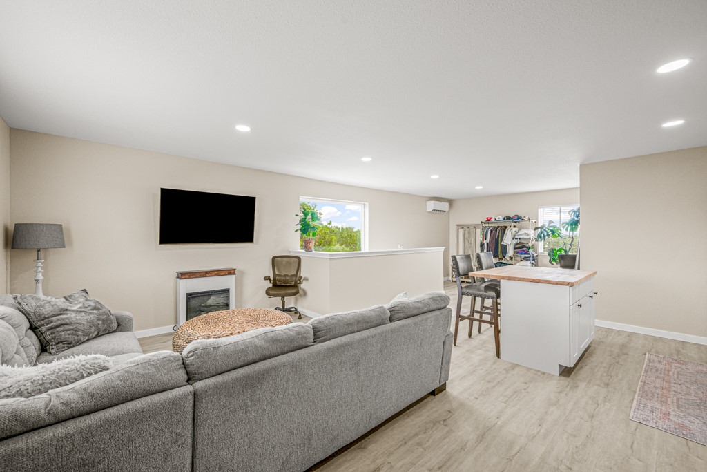 Undisclosed Address Spring Branch, TX 78070 - Photo 36 of 40 a living room with furniture and a flat screen tv