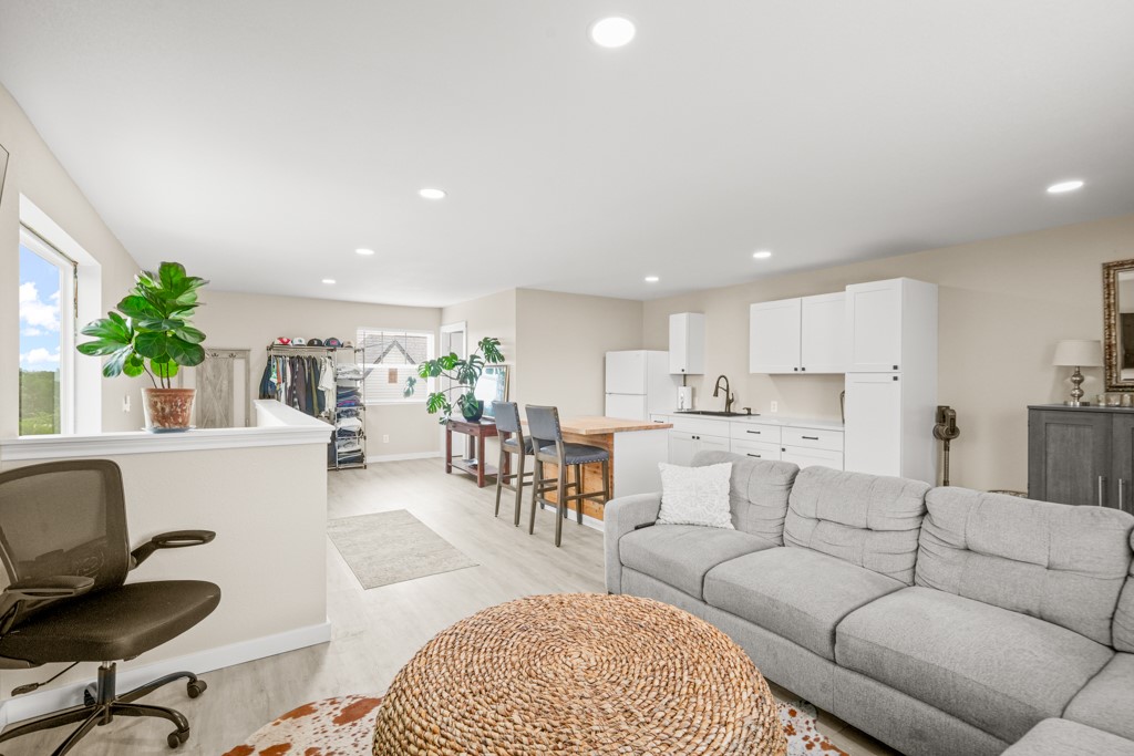 Undisclosed Address Spring Branch, TX 78070 - Photo 37 of 40 a living room with furniture kitchen view and a potted plant