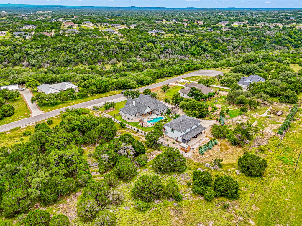 Undisclosed Address Spring Branch, TX 78070 - Photo 40 of 40 a view of a yard with an umbrella