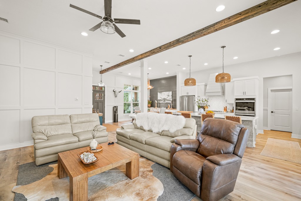 Undisclosed Address Spring Branch, TX 78070 - Photo 4 of 40 a living room with furniture kitchen view and a chandelier