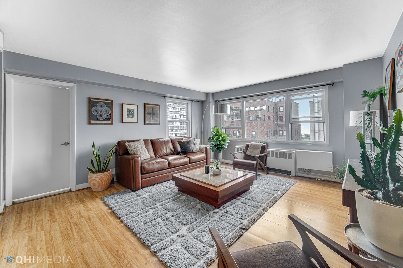 2909 North Sheridan Road, Unit 1502 Chicago, IL 60657 - Photo 6 of 19 a living room with furniture and a large window