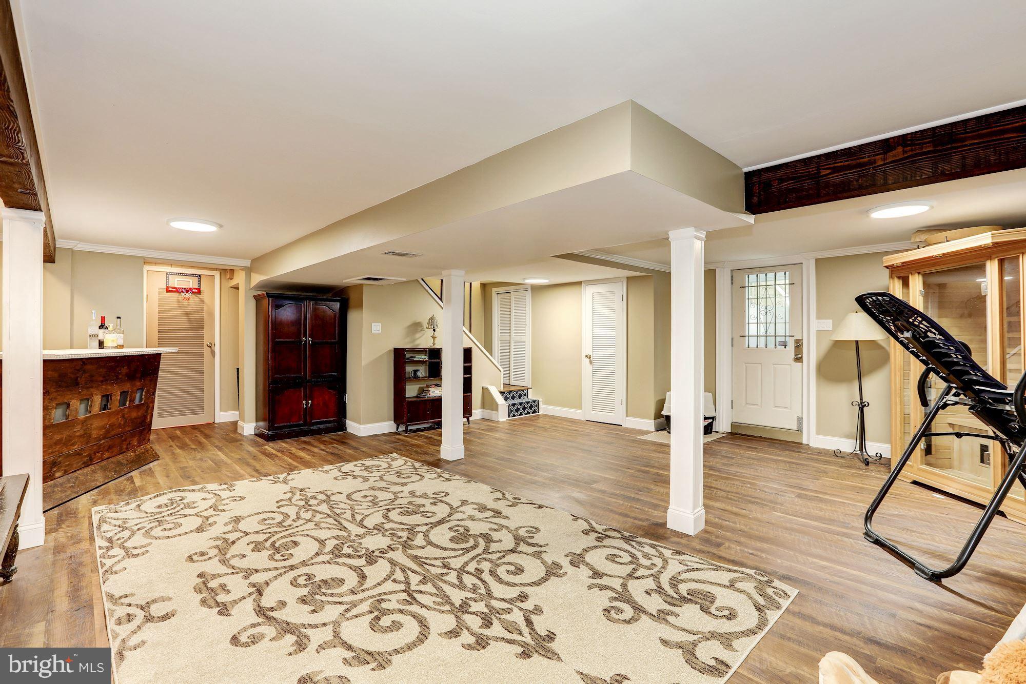 11417 Newport Mill Road Silver Spring, MD 20902 - Photo 14 of 21 a view of a livingroom with wooden floor and furniture