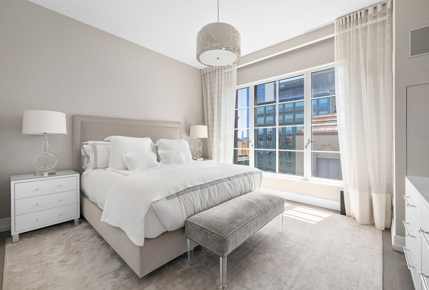 70 Charlton Street, Unit PHC Manhattan, NY 10014 - Photo 11 of 18 a spacious bedroom with a bed and a large window