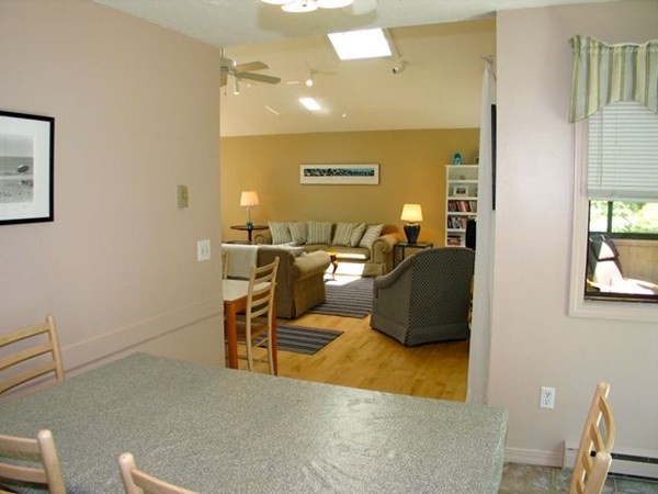 175 Meetinghouse Way Edgartown, MA 02539 - Photo 19 of 21 a living room with couches chairs and painted walls