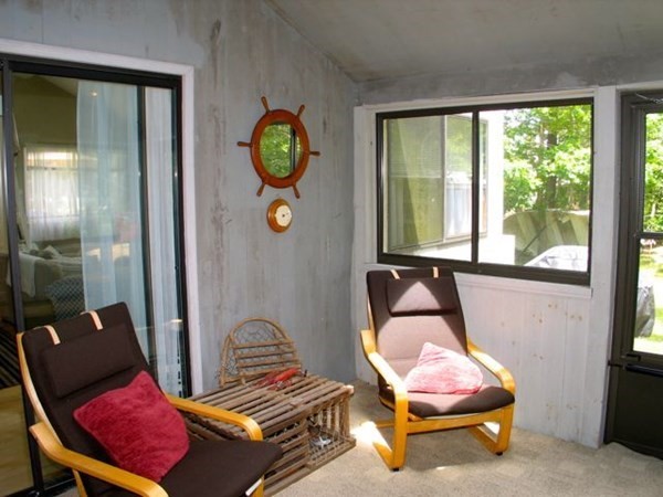 175 Meetinghouse Way Edgartown, MA 02539 - Photo 20 of 21 a living room with furniture and windows