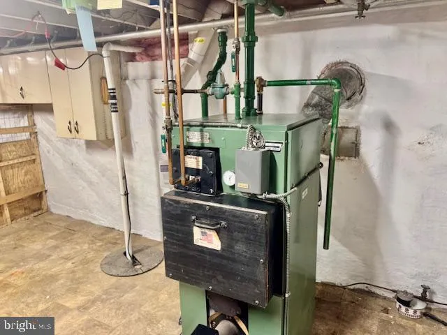 a front view of a house with glass windows and door