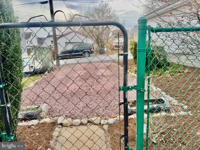 a view of multiple houses with yard