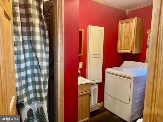 a utility room with dryer and washer