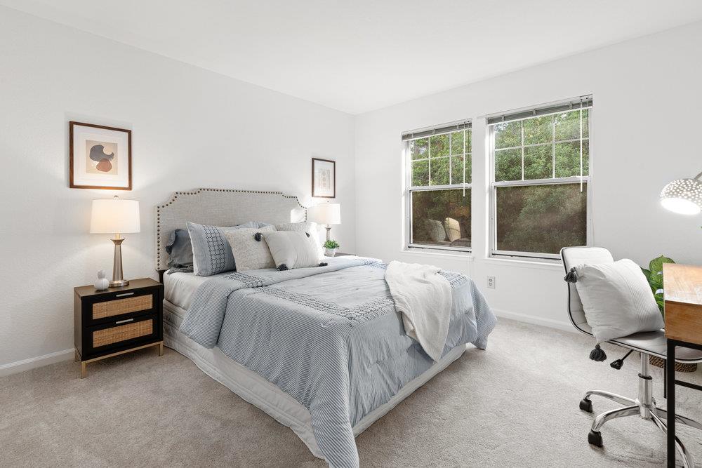 10930 Miramonte Road Cupertino, CA 95014 - Photo 37 of 50 a bedroom with bed and a window