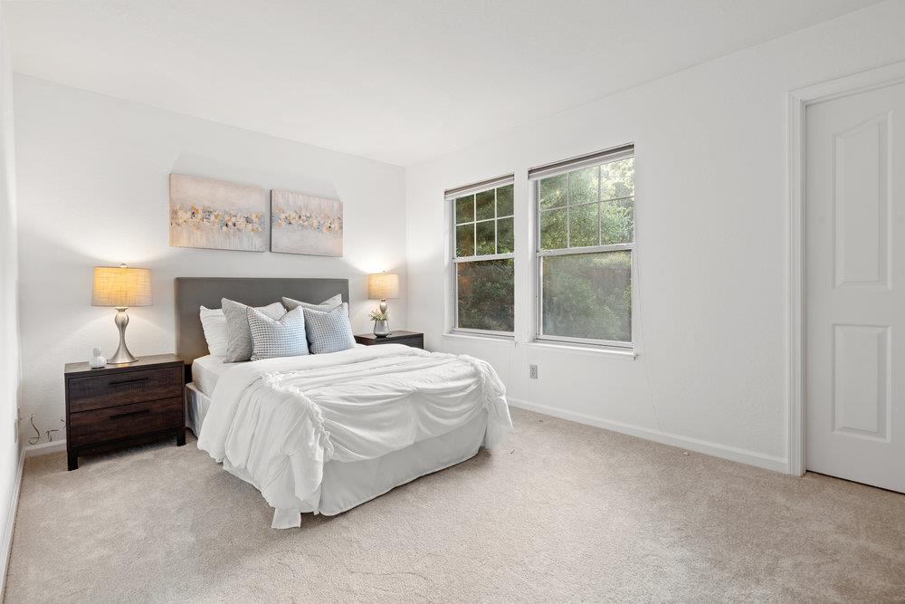 10930 Miramonte Road Cupertino, CA 95014 - Photo 41 of 50 a bedroom with a bed and a window