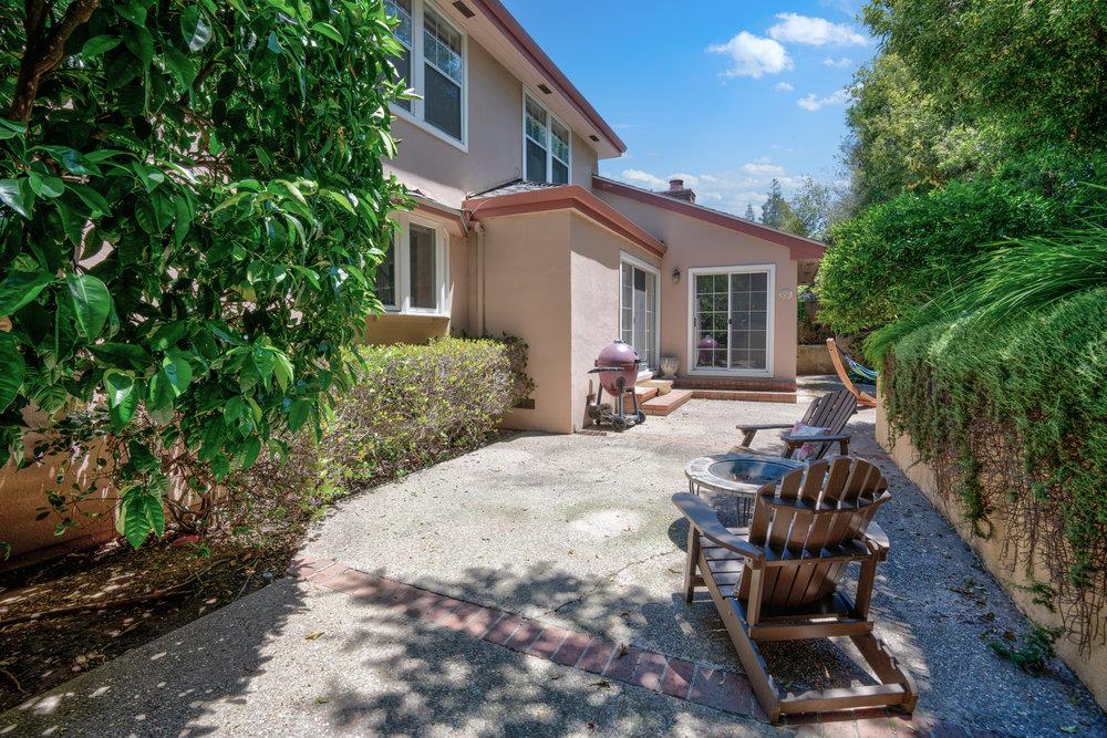 10930 Miramonte Road Cupertino, CA 95014 - Photo 43 of 50 a view of a patio with table and chairs and potted plants