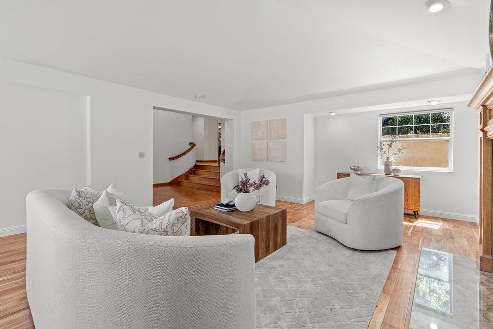 10930 Miramonte Road Cupertino, CA 95014 - Photo 5 of 50 a living room with furniture and a wooden floor